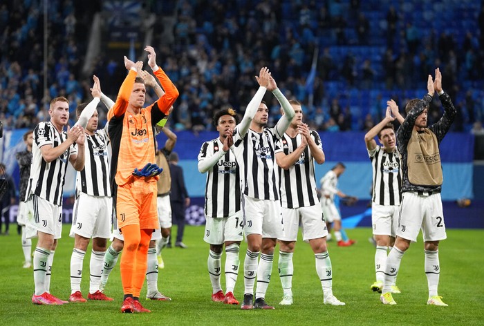 Juventus celebrate their victory after the Champions League group H soccer match between Zenit St. Petersburg and Juventus at the Gazprom Arena in St.Petersburg, Russia, Wednesday, Oct. 20, 2021. (AP Photo/Dmitry Lovetsky)
