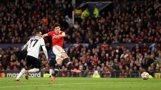 MANCHESTER, ENGLAND - OCTOBER 20: Harry Maguire of Manchester United scores their side's second goal during the UEFA Champions League group F match between Manchester United and Atalanta at Old Trafford on October 20, 2021 in Manchester, England. (Photo by Naomi Baker/Getty Images)
