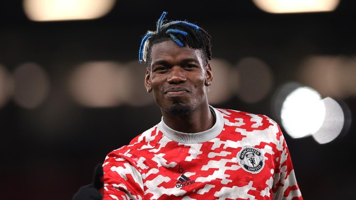 MANCHESTER, ENGLAND - OCTOBER 20: Paul Pogba of Manchester United gestures during the warm up prior to the UEFA Champions League group F match between Manchester United and Atalanta at Old Trafford on October 20, 2021 in Manchester, England. (Photo by Naomi Baker/Getty Images)
