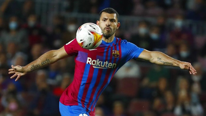 Barcelonas Sergio Aguero controls the ball during the Spanish La Liga soccer match between FC Barcelona and Valencia at the Camp Nou stadium in Barcelona, Spain, Sunday, Oct. 17, 2021. (AP Photo/Joan Monfort)