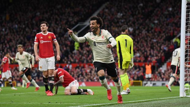 MANCHESTER, ENGLAND - OCTOBER 24: Mohamed Salah of Liverpool celebrates after scoring their side's third goal during the Premier League match between Manchester United and Liverpool at Old Trafford on October 24, 2021 in Manchester, England. (Photo by Michael Regan/Getty Images)