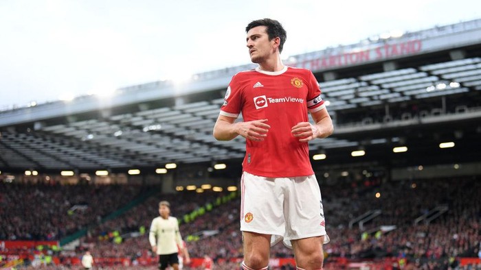 MANCHESTER, ENGLAND - OCTOBER 24: Harry Maguire of Manchester United looks on during the Premier League match between Manchester United and Liverpool at Old Trafford on October 24, 2021 in Manchester, England. (Photo by Michael Regan/Getty Images)
