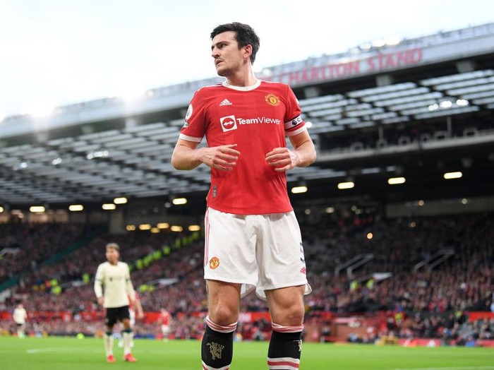 MANCHESTER, ENGLAND - OCTOBER 24: Harry Maguire of Manchester United looks on during the Premier League match between Manchester United and Liverpool at Old Trafford on October 24, 2021 in Manchester, England. (Photo by Michael Regan/Getty Images)