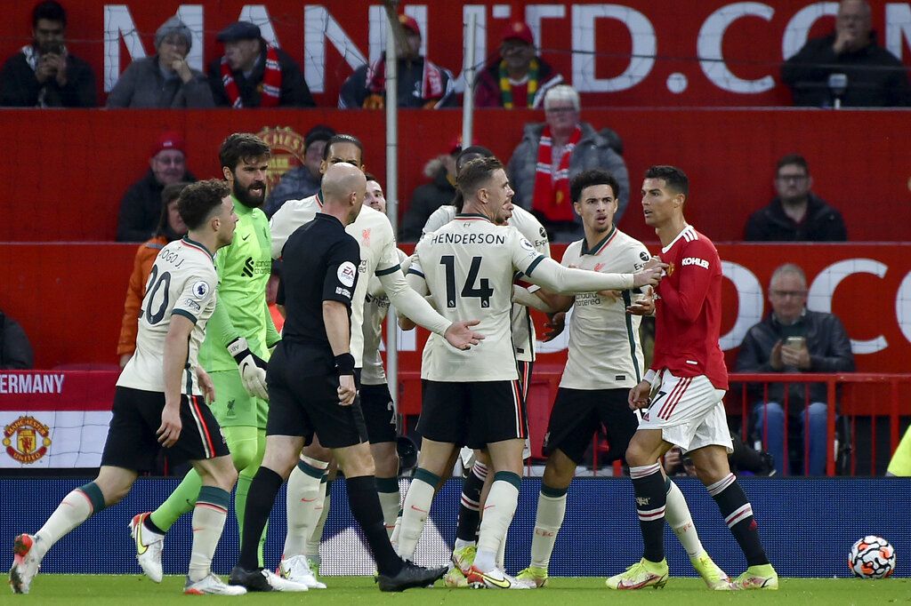 Manchester United's Cristiano Ronaldo leaves the field at the end of the English Premier League soccer match between Manchester United and Liverpool at Old Trafford in Manchester, England, Sunday, Oct. 24, 2021. Liverpool won 5-0. (AP Photo/Rui Vieira)