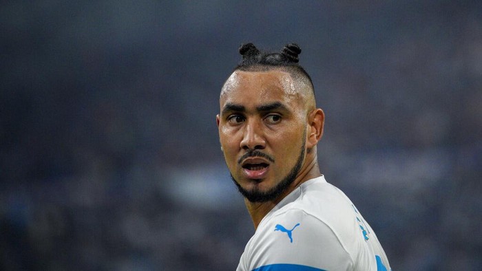 Marseilles Dimitri Payet looks on during the French League One soccer match between Marseille and FC Lorient at the Velodrome stadium in Marseille, France, Sunday, Oct. 17, 2021. (AP Photo/Daniel Cole)