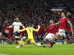Si Raja Mesir mencetak gol ketiganya ke gawang Manchester United lima menit babak kedua berjalan. Pemain 29 tahun itu memaksimalkan umpan terobosan Jordan Henderson, sebelum menembak bola di kotak penalti. Martin Rickett/PA via AP.