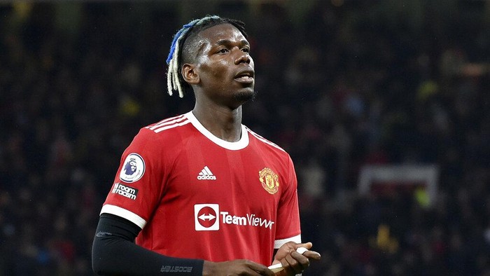Manchester Uniteds Paul Pogba leaves the pitch after being shown a red card during the English Premier League soccer match between Manchester United and Liverpool at Old Trafford in Manchester, England, Sunday, Oct. 24, 2021. (AP Photo/Rui Vieira)
