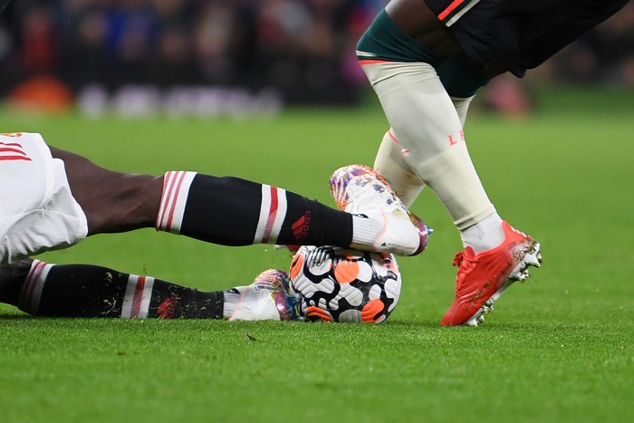Paul Pogba MANCHESTER, ENGLAND - OCTOBER 24: Naby Keita of Liverpool is fouled by Paul Pogba of Manchester United leading to a red card being shown following a VAR review during the Premier League match between Manchester United and Liverpool at Old Trafford on October 24, 2021 in Manchester, England. (Photo by Michael Regan/Getty Images)