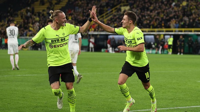 DORTMUND, GERMANY - OCTOBER 26: Thorgan Hazard of Dortmund celebrates after scoring his teams second goal during the DFB Cup second round match between Borussia Dortmund and FC Ingolstadt 04 at Signal Iduna Park on October 26, 2021 in Dortmund, Germany. (Photo by Lars Baron/Getty Images)