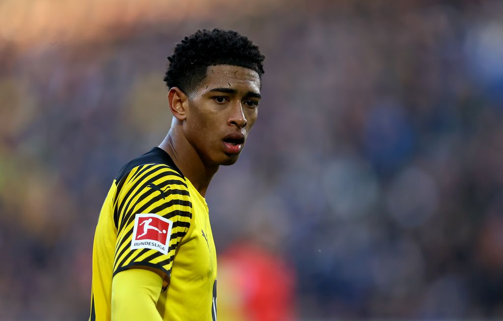 jude bellingham borussia dortmund BIELEFELD, GERMANY - OCTOBER 23: Jude Bellingham of Borussia Dortmund looks on during the Bundesliga match between DSC Arminia Bielefeld and Borussia Dortmund at Schueco Arena on October 23, 2021 in Bielefeld, Germany. (Photo by Martin Rose/Getty Images)