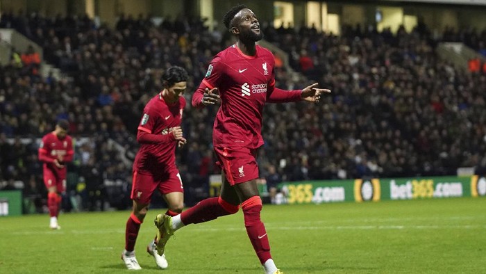 Liverpools Divock Origi celebrates after scoring his sides second goal during the English League Cup soccer match between Preston North End and Liverpool at Deepdale Stadium in Preston, England, Wednesday, Oct. 27, 2021. (AP Photo/Jon Super)