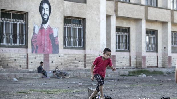GHARBIA, EGYPT - JUNE 01: Egyptian boys play football at the Mohamed Salah Youth Center, where Liverpool's Egyptian footballer Mohamed Salah was born and raised in the village of Nagrig, in the central province of Gharbia in the Nile Delta, on June 01, 2019 in Gharbia, Egypt. (Photo by Mahmoud Khaled/Getty Images)