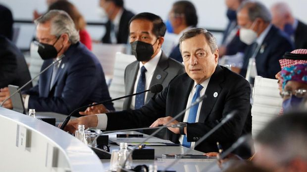 Italian Prime Minister Mario Draghi arrives for a roundtable meeting during the G20 summit in Rome, Italy, October 30, 2021. REUTERS/Remo Casilli