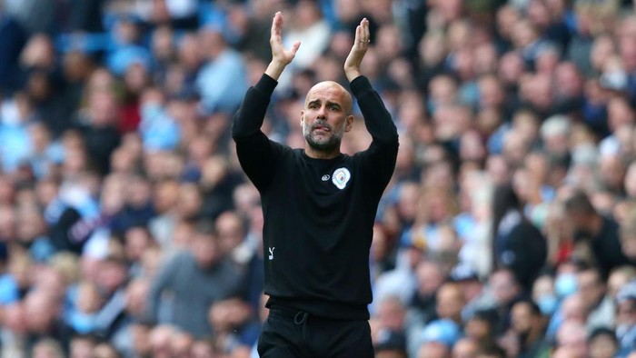 MANCHESTER, ENGLAND - OCTOBER 16: Pep Guardiola, Manager of Manchester City reacts during the Premier League match between Manchester City and Burnley at Etihad Stadium on October 16, 2021 in Manchester, England. (Photo by Alex Livesey/Getty Images)
