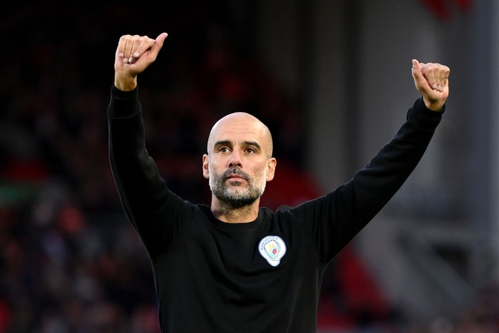 LIVERPOOL, ENGLAND - OCTOBER 03: Pep Guardiola, Manager of Manchester City acknowledges the fans following the Premier League match between Liverpool and Manchester City at Anfield on October 03, 2021 in Liverpool, England. (Photo by Michael Regan/Getty Images)