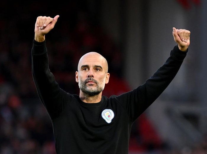 LIVERPOOL, ENGLAND - OCTOBER 03: Pep Guardiola, Manager of Manchester City acknowledges the fans following the Premier League match between Liverpool and Manchester City at Anfield on October 03, 2021 in Liverpool, England. (Photo by Michael Regan/Getty Images)