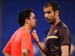 Dulu, Xavi adalah pemain andalan Pep Guardiola saat melatih Barcelona di tahun 2008-2012 (Getty Images)