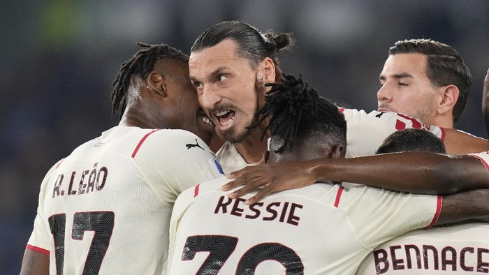 AC Milans Zlatan Ibrahimovic celebrates after scoring his sides opening goal during the Series A soccer match between Roma and AC Milan at Romes Olympic stadium, in Rome, Sunday, Oct. 31, 2021. (AP Photo/Gregorio Borgia)