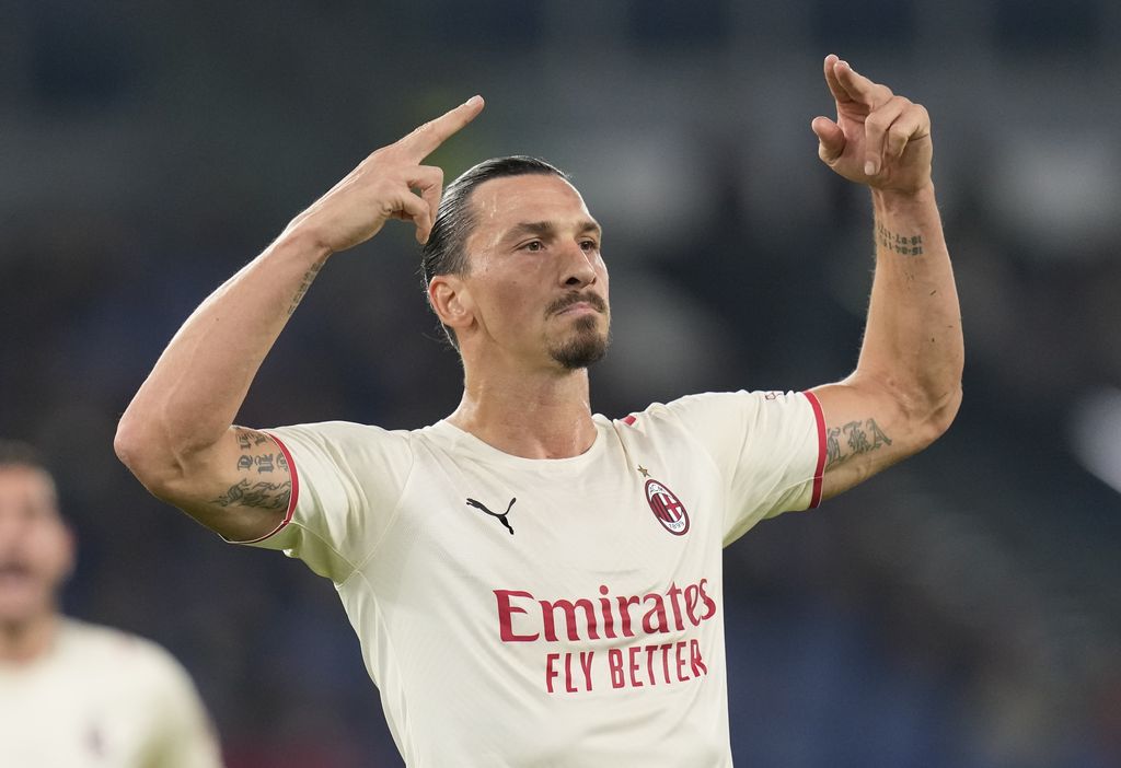 AC Milan's Zlatan Ibrahimovic celebrates after scoring his side's opening goal during the Series A soccer match between Roma and AC Milan at Rome's Olympic stadium, in Rome, Sunday, Oct. 31, 2021. (AP Photo/Gregorio Borgia)