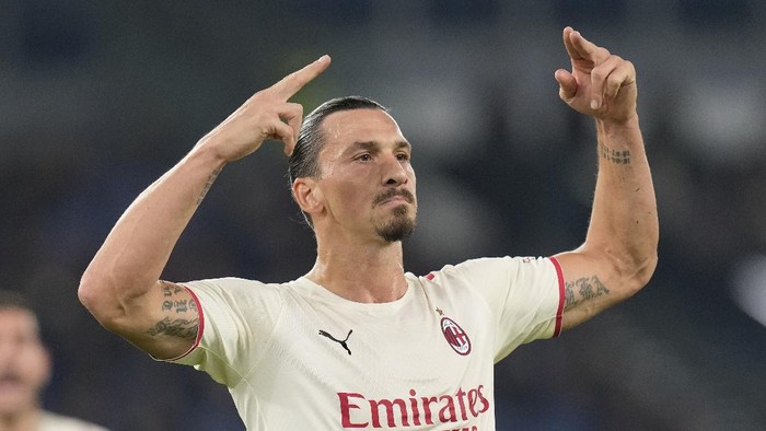 AC Milans Zlatan Ibrahimovic celebrates after scoring his sides opening goal during the Series A soccer match between Roma and AC Milan at Romes Olympic stadium, in Rome, Sunday, Oct. 31, 2021. (AP Photo/Gregorio Borgia)