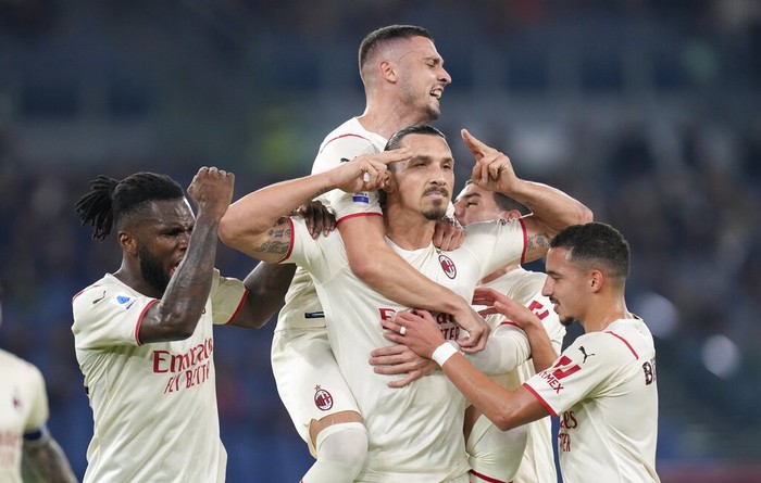 AC Milans Zlatan Ibrahimovic celebrates after scoring his sides opening goal during the Series A soccer match between Roma and AC Milan at Romes Olympic stadium, in Rome, Sunday, Oct. 31, 2021. (AP Photo/Gregorio Borgia)