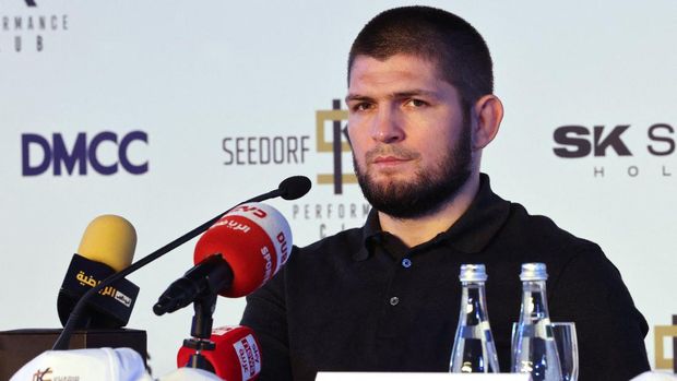 Former UFC champion Khabib Nurmagomedov announces the launch of Seedorf Khabib Performance Club, a football school with a training methodology combining football and mixed martial arts (MMA), during a press conference in Dubai on November 1, 2021. (Photo by Giuseppe CACACE / AFP)