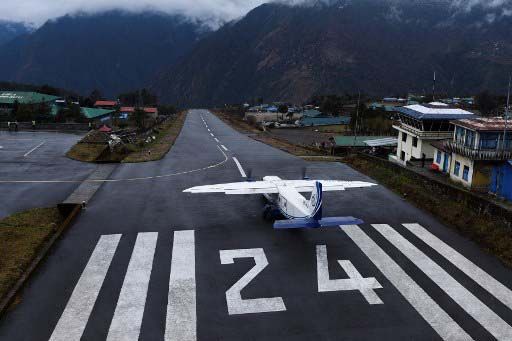 A private aircraft prepares for take off at the Tenzing-Hillary Airport in Lukla, some 140 kms northeast of Kathmandu on March 22, 2020. - Nepal has suspended mountain expeditions and trekking amid the COVID-19 coronavirus outbreak. (Photo by PRAKASH MATHEMA / AFP)