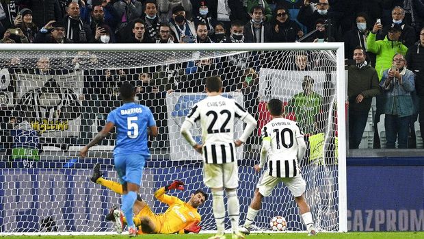 Juventus'  Paulo Dybala scores a goal from the penalty spot, during the Champions League, group H soccer match between Juventus and Zenit St. Petersburg, at the Allianz stadium in Turin, Italy, Tuesday, Nov. 2, 2021. (Marco Alpozzi/LaPresse via AP)