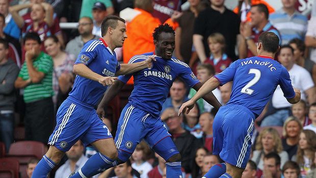 Chelsea 2010 LONDON, ENGLAND - SEPTEMBER 11: Michael Essien of Chelsea (C) celebrates with John Terry (L) and Branislav Ivanovic as he scores their first goal during the Barclays Premier League match between West Ham United and Chelsea at the Boleyn Ground on September 11, 2010 in London, England. (Photo by Hamish Blair/Getty Images)