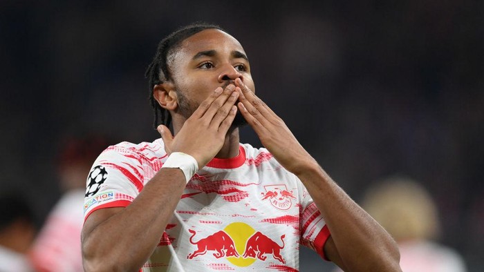 LEIPZIG, GERMANY - NOVEMBER 03: Christopher Nkunku of Leipzig celebrates scoring his goal during the UEFA Champions League group A match between RB Leipzig and Paris Saint-Germain at Red Bull Arena on November 03, 2021 in Leipzig, Germany. (Photo by Stuart Franklin/Getty Images)