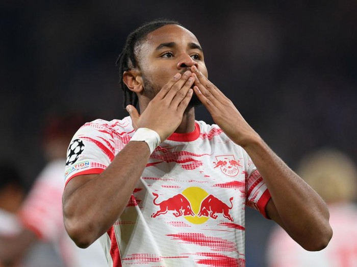 LEIPZIG, GERMANY - NOVEMBER 03: Christopher Nkunku of Leipzig celebrates scoring his goal during the UEFA Champions League group A match between RB Leipzig and Paris Saint-Germain at Red Bull Arena on November 03, 2021 in Leipzig, Germany. (Photo by Stuart Franklin/Getty Images)
