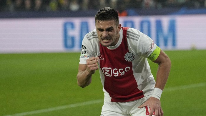 Ajaxs Dusan Tadic celebrates after scoring his sides opening goal during the Champions League group C soccer match between Borussia Dortmund and Ajax Amsterdam in Dortmund, Germany, Wednesday, Nov. 3, 2021. (AP Photo/Martin Meissner)