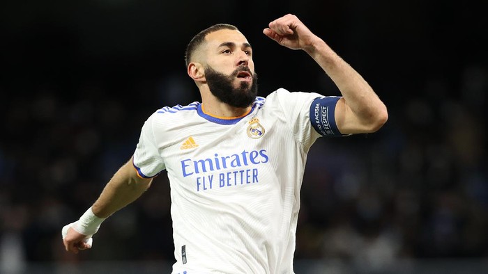 Karim Benzema MADRID, SPAIN - NOVEMBER 03: Karim Benzema of Real Madrid celebrates after scoring their team's first goal during the UEFA Champions League group D match between Real Madrid and Shakhtar Donetsk at Estadio Santiago Bernabeu on November 03, 2021 in Madrid, Spain. (Photo by Gonzalo Arroyo Moreno/Getty Images)