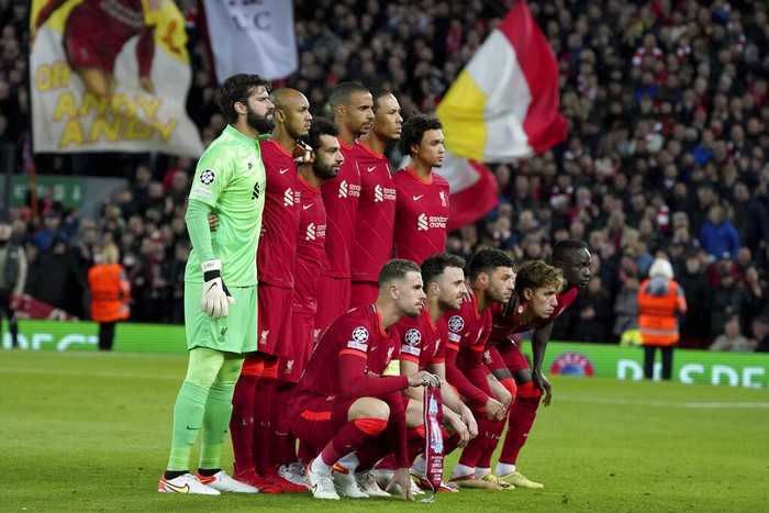 Liverpool players pose for photographers before the Champions League group B soccer match between Liverpool and Atletico Madrid in Liverpool, England, Wednesday, Nov. 3, 2021.(AP Photo/Jon Super)