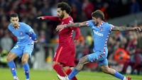 Kemenangan ini memastikan Liverpool lolos ke babak 16 besar Liga Champions 2021/2022. The Reds berada di puncak klasemen Grup B dengan 12 poin, sementara Atletico turun ke urutan ketiga dengan 4 poin. AP Photo/Jon Super.