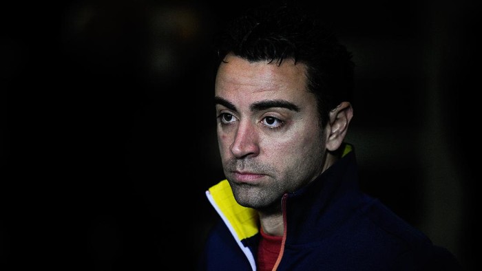 MALAGA, SPAIN - JANUARY 24:  Xavi Hernandez of FC Barcelona looks on prior to the Copa del Rey Quarter Final 2nd leg match between Malaga CF and FC Barcelona at La Rosaleda Stadium on January 24, 2013 in Malaga, Spain.  (Photo by David Ramos/Getty Images)