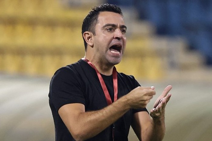 FBL-SADD-XAVI Qatari football club al-Sadd SC's Spanish coach Xavi Hernandez reacts during Qatar Stars League match between al-Sadd SC and al-Duhail SC, at Thani Bin Jassim Stadium (Al-Gharafah Stadium) in Qatar's capital Doha on November 3, 2021. (Photo by KARIM JAAFAR / AFP)