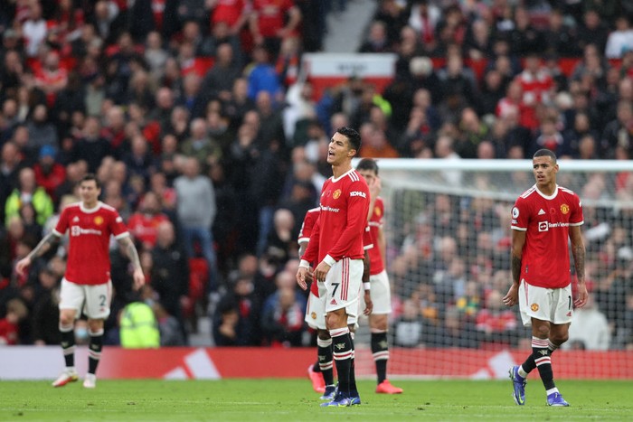Cristiano Ronaldo MANCHESTER, ENGLAND - NOVEMBER 06: Cristiano Ronaldo of Manchester United looks dejected following Manchester City's second goal during the Premier League match between Manchester United and Manchester City at Old Trafford on November 06, 2021 in Manchester, England. (Photo by Clive Brunskill/Getty Images)