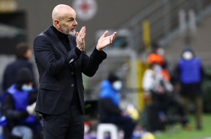 MILAN, ITALY - JANUARY 26: Stefano Pioli, Head coach of AC Milan  reacts during the Coppa Italia match between FC Internazionale and AC Milan at Stadio Giuseppe Meazza on January 26, 2021 in Milan, Italy. Sporting stadiums around Italy remain under strict restrictions due to the Coronavirus Pandemic as Government social distancing laws prohibit fans inside venues resulting in games being played behind closed doors. (Photo by Marco Luzzani/Getty Images)