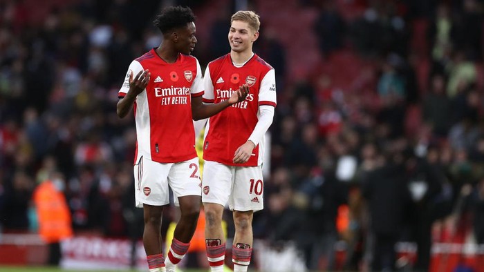 LONDON, ENGLAND - NOVEMBER 07: Albert Sambi Lokonga and Emile Smith Rowe of Arsenal smile after the Premier League match between Arsenal and Watford at Emirates Stadium on November 07, 2021 in London, England. (Photo by Ryan Pierse/Getty Images)