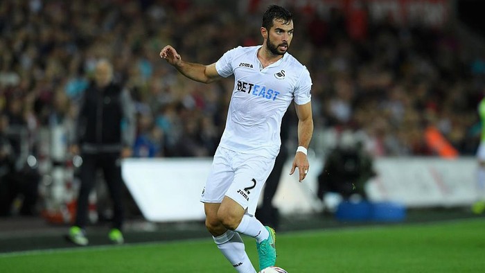 SWANSEA, WALES - SEPTEMBER 21:  Jordi Amat of Swansea in action during the EFL Cup Third Round match between Swansea City and Manchester City at the Liberty Stadium on September 21, 2016 in Swansea, Wales.  (Photo by Stu Forster/Getty Images)