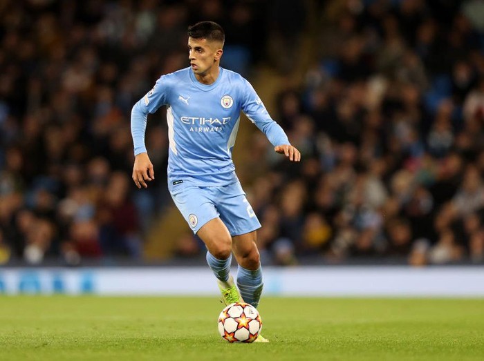 MANCHESTER, ENGLAND - NOVEMBER 03: Joao Cancelo of Manchester City in action during the UEFA Champions League group A match between Manchester City and Club Brugge KV at Etihad Stadium on November 03, 2021 in Manchester, England. (Photo by Naomi Baker/Getty Images)