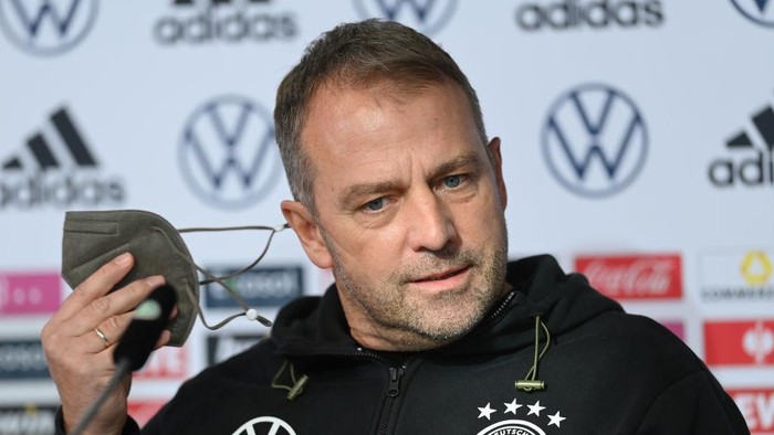 WOLFSBURG, GERMANY - NOVEMBER 10: Hansi Flick, Head coach of Germany talks with the media during a press conference on November 10, 2021 in Wolfsburg, Germany. (Photo by Stuart Franklin/Getty Images)