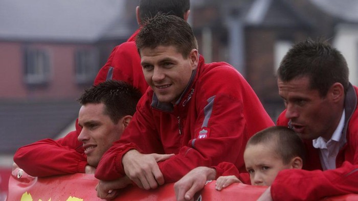 LIVERPOOL, UNITED KINGDOM - MAY 14:  (L-R) Steve Finnan, Steven Gerrard, Jamie Carragher and his son Jamie during the Liverpool Football Club FA Cup Trophy Parade on May 14, 2006 in Liverpool, England.  (Photo by Michael Steele/Getty Images)