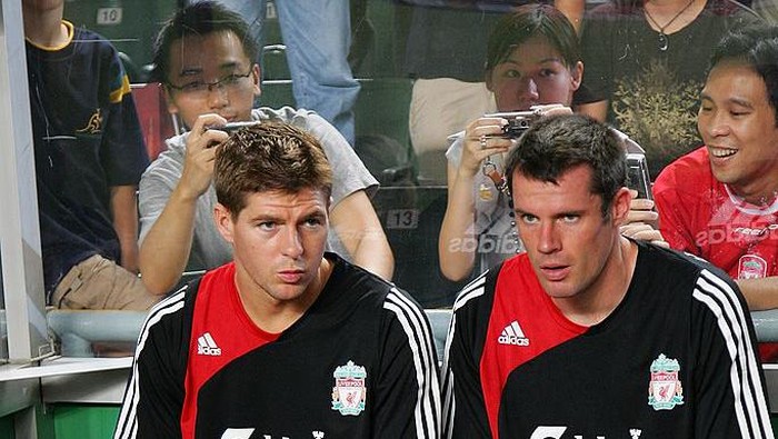 HONG KONG, CHINA - JULY 27:  Steven Gerrard of Liverpool and James Carragher sit on the bench during the pre-season Barclays Asia Trophy final match between Liverpool FC and Portsmouth FC at Hong Kong Stadium on July 27, 2007 in Hong Kong, China.  (Photo by MN Chan/Getty Images)