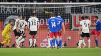 Gol keenam Jerman dicetak Thomas Mueller pada menit ke-76, memanfaatkan assist Florian Neuhaus. Stuart Franklin/Getty Images.