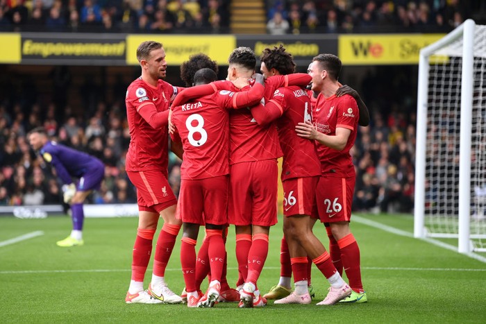 WATFORD, ENGLAND - OCTOBER 16: Roberto Firmino of Liverpool celebrates after scoring their sides third goal during the Premier League match between Watford and Liverpool at Vicarage Road on October 16, 2021 in Watford, England. (Photo by Justin Setterfield/Getty Images)