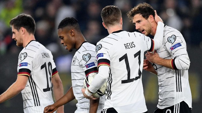 WOLFSBURG, GERMANY - NOVEMBER 11: Marco Reus (R) of Germany celebrate with team mate Leon Goretzka after he scores his teams 2nd goal during the 2022 FIFA World Cup Qualifier match between Germany and Liechtenstein at Volkswagen Arena on November 11, 2021 in Wolfsburg, Germany. (Photo by Stuart Franklin/Getty Images)
