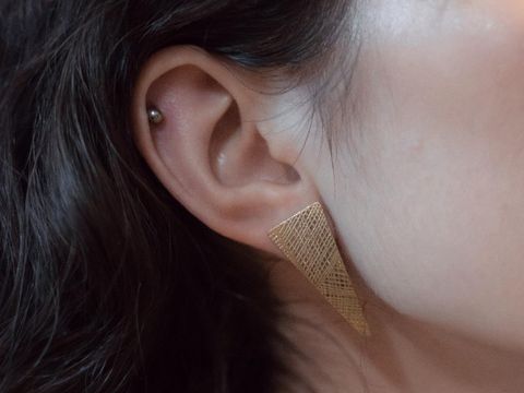 Hindari membersihkan telinga dengan cutton bud