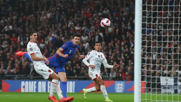 LONDON, ENGLAND - NOVEMBER 12: Harry Maguire of England scores their side's first goal during the 2022 FIFA World Cup Qualifier match between England and Albania at Wembley Stadium on November 12, 2021 in London, England. (Photo by Clive Rose/Getty Images)